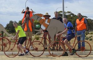 Victor Harbor Rotarians and avid local cyclists have been helping with this year's Tour Down Under. We caught them erecting the now famous kangaroos and orange bikes in conjunction with the city of Victor Harbor.